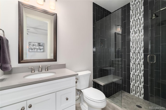 8033 Galileo Way, Littleton, CO 80125 - full bathroom with a shower stall, toilet, and vanity