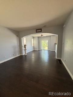 unfurnished living room featuring hardwood / wood-style floors