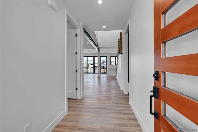804 Spyglass Cir, Louisville, CO 80027 - hallway with baseboards, recessed lighting, and light wood finished floors