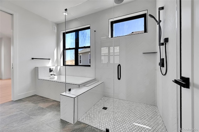804 Spyglass Cir, Louisville, CO 80027 - full bathroom featuring baseboards, visible vents, a stall shower, and a wealth of natural light