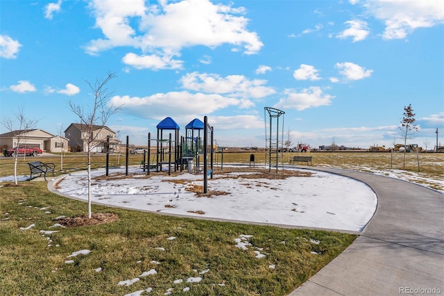 view of jungle gym featuring a lawn