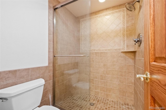 bathroom with walk in shower and toilet