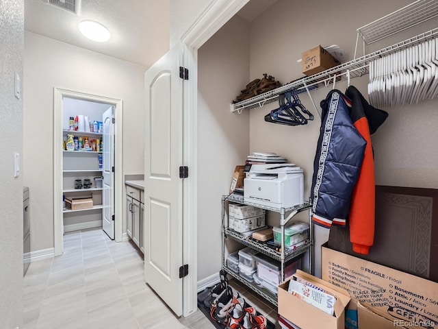 closet featuring visible vents