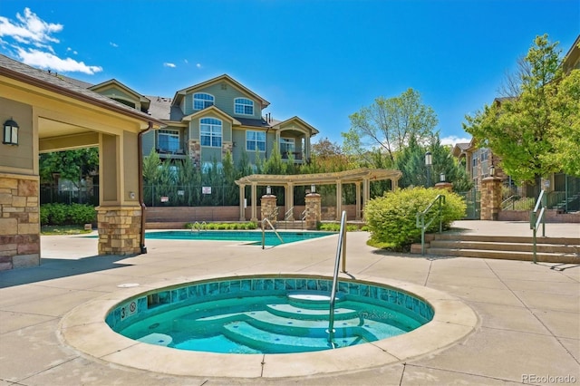 18669 Stroh Rd Unit 10208, Parker, CO 80134 - community pool featuring a hot tub, a patio area, and a pergola