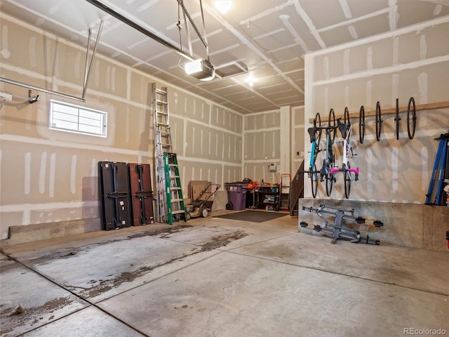 garage featuring a garage door opener