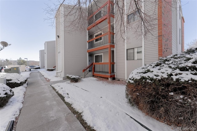 view of snow covered property