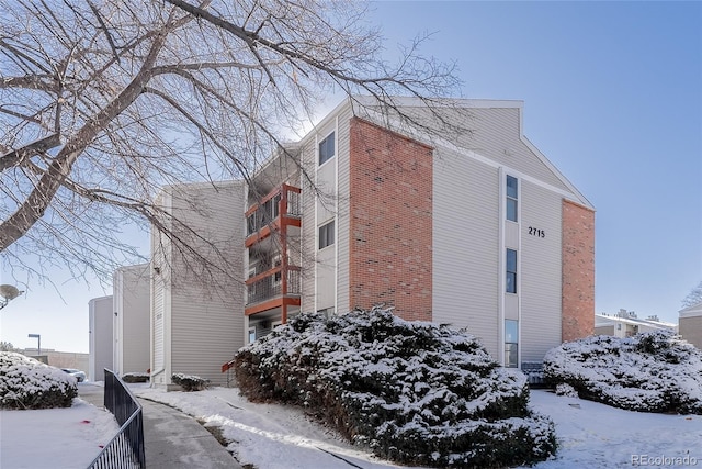 view of snow covered property