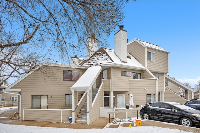 exterior space featuring a chimney