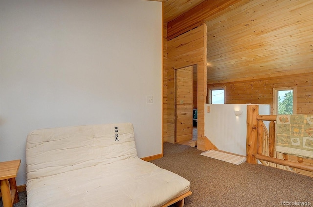 bedroom featuring carpet, wood ceiling, wood walls, and vaulted ceiling