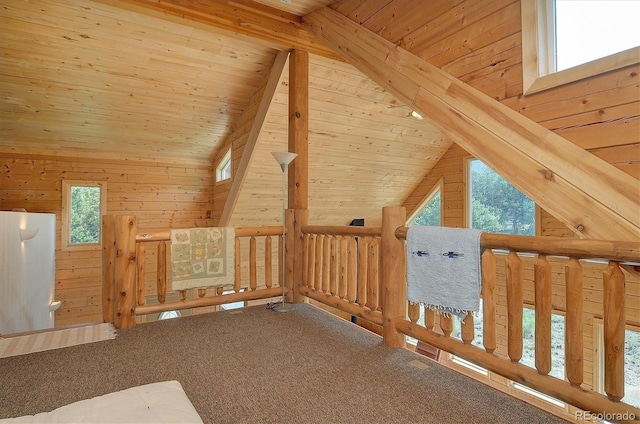 bonus room with wooden walls, carpet, beamed ceiling, wooden ceiling, and high vaulted ceiling