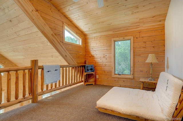 interior space featuring wooden ceiling, carpet flooring, wood walls, and vaulted ceiling