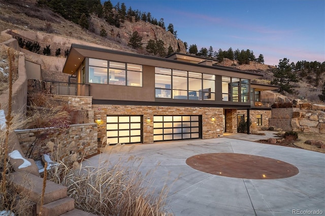 modern home featuring a garage