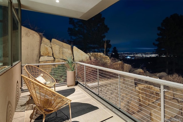 view of balcony at night