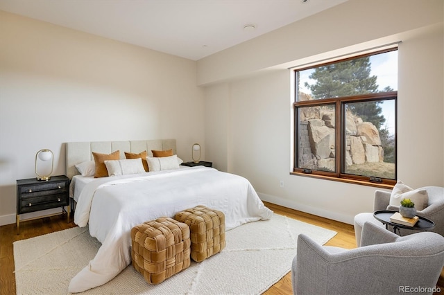 bedroom featuring hardwood / wood-style flooring