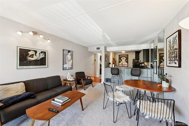 805 29th St Unit 308, Boulder, CO 80303 - living room featuring carpet and a dry bar