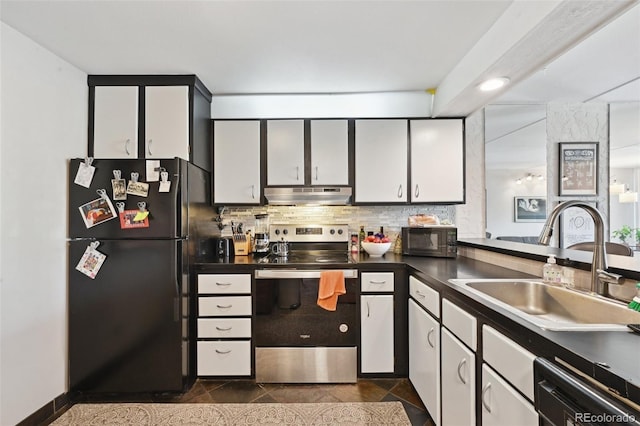 805 29th St Unit 308, Boulder, CO 80303 - kitchen with black appliances, under cabinet range hood, a sink, and dark countertops