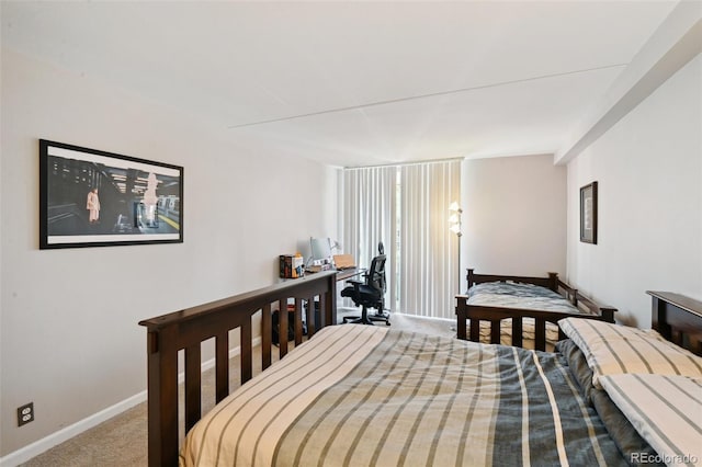 805 29th St Unit 308, Boulder, CO 80303 - bedroom featuring carpet floors, a desk, and baseboards