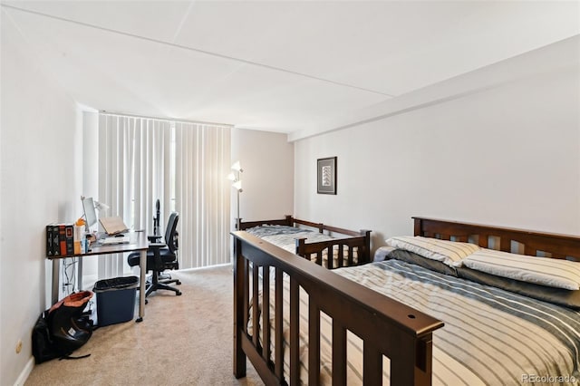 805 29th St Unit 308, Boulder, CO 80303 - bedroom with carpet flooring, baseboards, and an office area