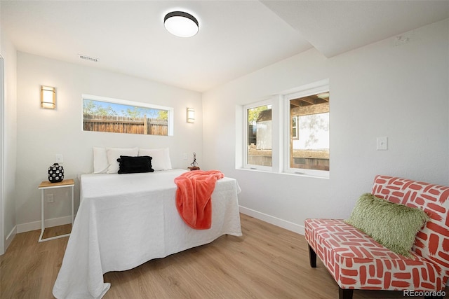 bedroom featuring hardwood / wood-style flooring