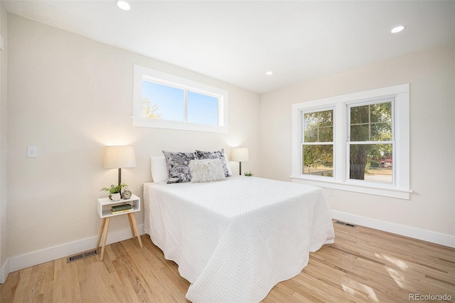 bedroom featuring light hardwood / wood-style floors