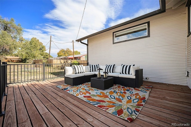 wooden terrace with outdoor lounge area