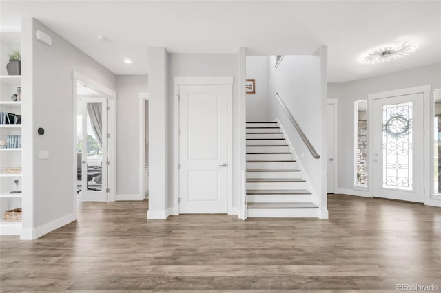 19887 Kershaw Ct, Monument, CO 80132 - entrance foyer featuring stairs, wood finished floors, and recessed lighting