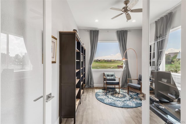 19887 Kershaw Ct, Monument, CO 80132 - living area with a ceiling fan, wood finished floors, and recessed lighting