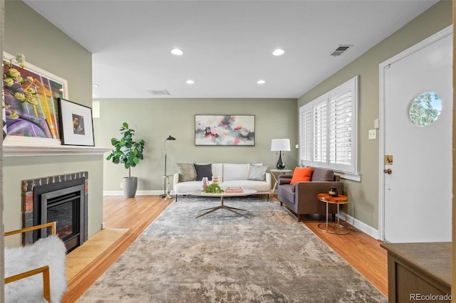 living room with light hardwood / wood-style floors