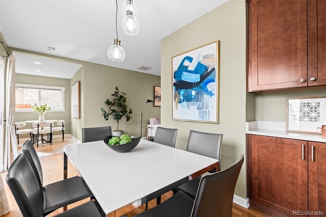 dining room featuring hardwood / wood-style floors