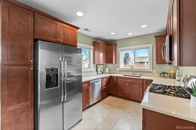 kitchen featuring stainless steel appliances and sink