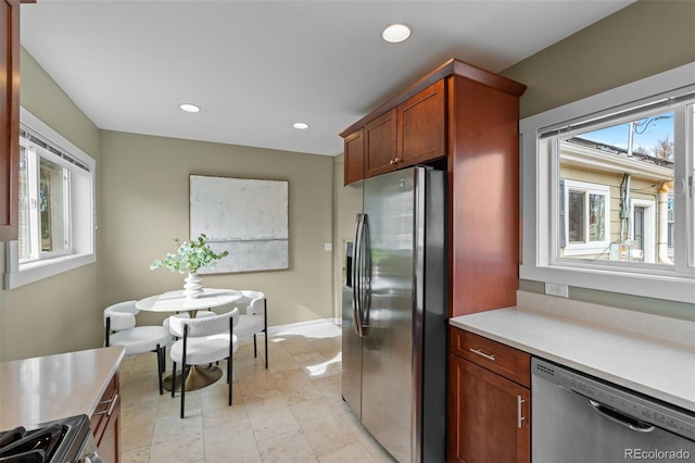 kitchen with a healthy amount of sunlight and appliances with stainless steel finishes