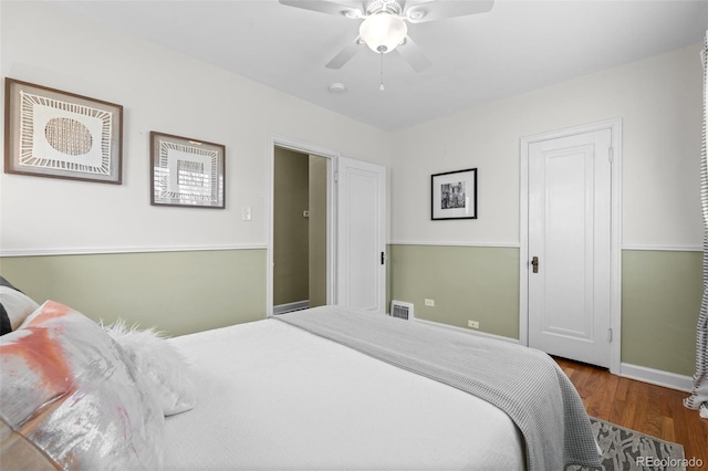 bedroom featuring ceiling fan and hardwood / wood-style floors