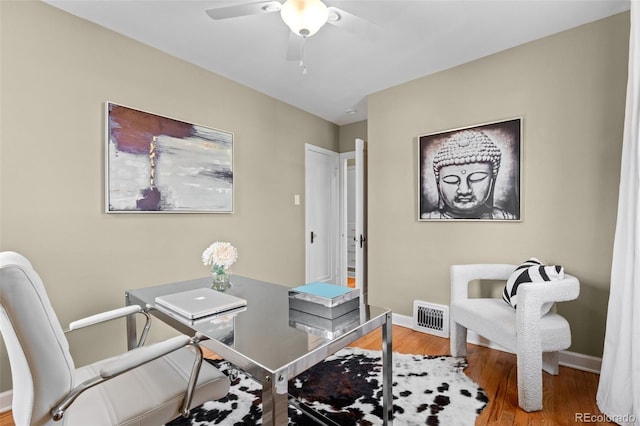 office area featuring hardwood / wood-style floors and ceiling fan