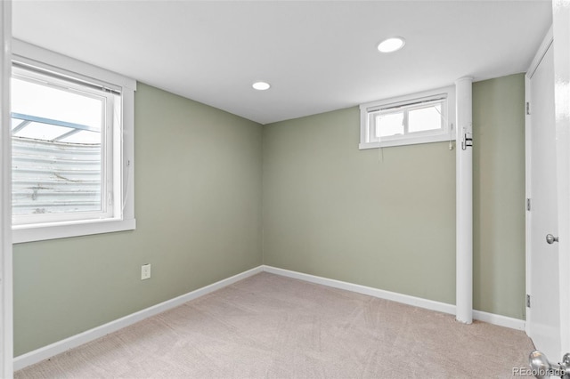 basement with light colored carpet