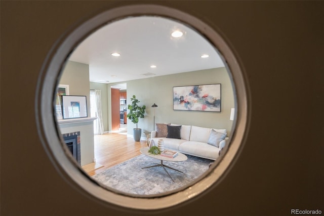 living room with light hardwood / wood-style floors