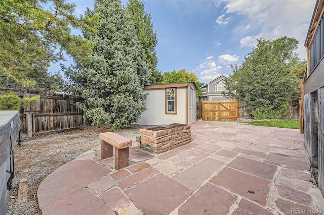 view of patio with an outdoor structure