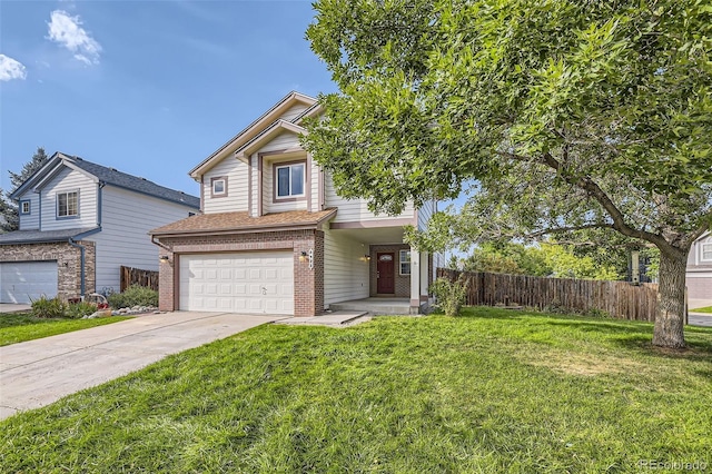 view of front of home with a front lawn and a garage