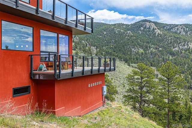 5896 Peregrine Trl, Golden, CO 80403 - view of mountain background featuring a heavily wooded area