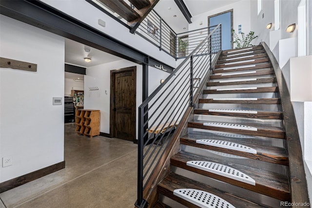 5896 Peregrine Trl, Golden, CO 80403 - stairs with concrete flooring and baseboards