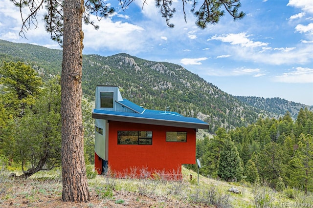 5896 Peregrine Trl, Golden, CO 80403 - mountain view featuring a forest