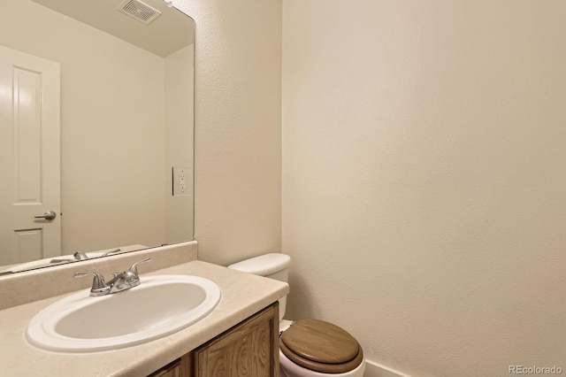 19259 E Caspian Pl, Aurora, CO 80013 - bathroom featuring toilet and vanity