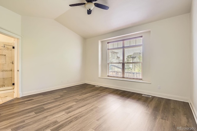 19259 E Caspian Pl, Aurora, CO 80013 - spare room with a ceiling fan, vaulted ceiling, and wood finished floors