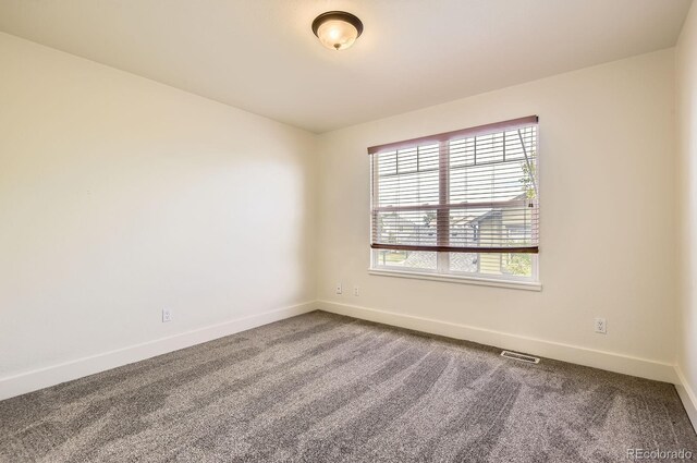 19259 E Caspian Pl, Aurora, CO 80013 - spare room featuring carpet flooring