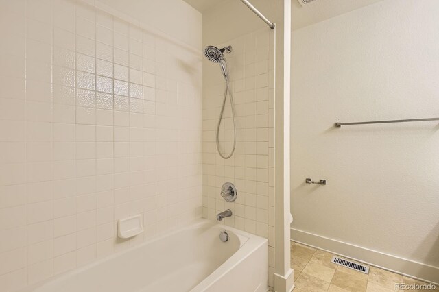 19259 E Caspian Pl, Aurora, CO 80013 - bathroom featuring baseboards and shower / washtub combination