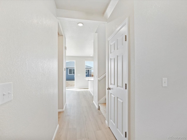 corridor featuring light wood-type flooring