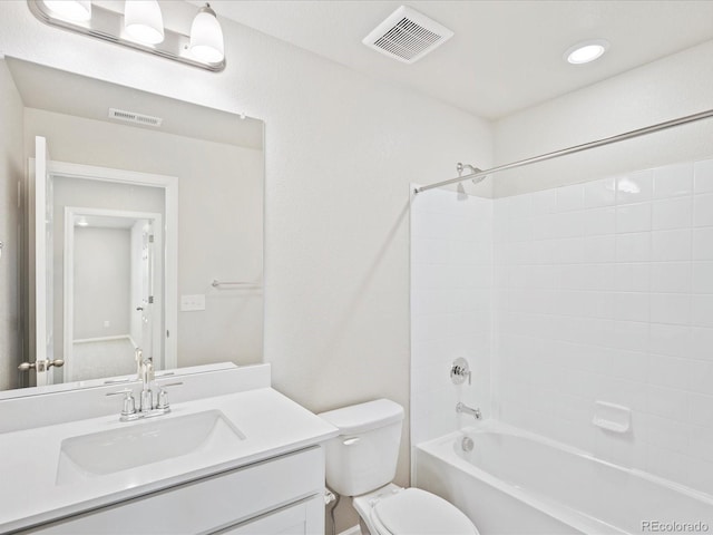 full bathroom with toilet, vanity, and washtub / shower combination