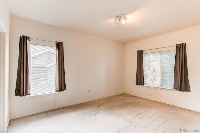 908 S Yampa St Unit 208, Aurora, CO 80017 - empty room featuring carpet floors and baseboards