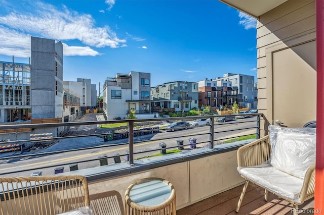 balcony featuring a city view