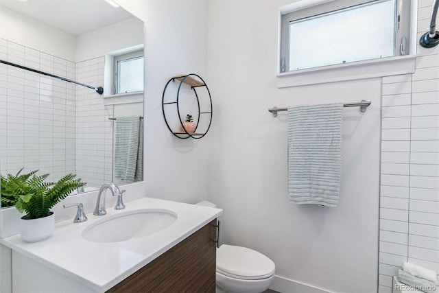 1216 Perry St, Denver, CO 80204 - bathroom with vanity and a shower