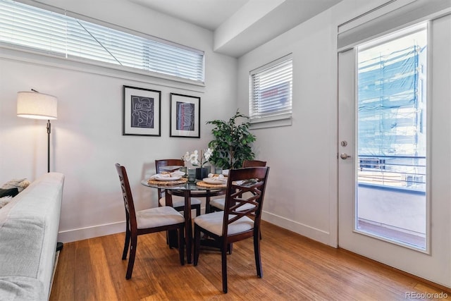 1216 Perry St, Denver, CO 80204 - dining area featuring light wood-type flooring and baseboards